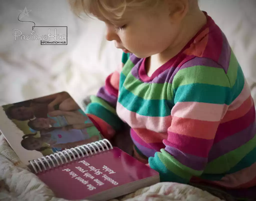 a boy read a Board book